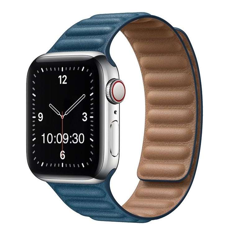 Stylish synthetic leather Apple Watch strap with magnetic loop in blue, shown on watch.