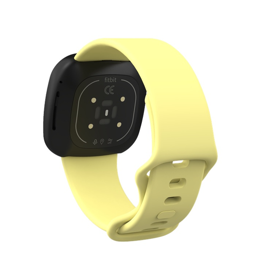 Fitbit Versa 3 compatible yellow strap showing design and fit.