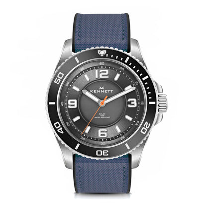 Kennett Solaxplorer Solar Watch with stainless steel case, blue strap, and unidirectional bezel.