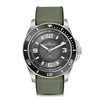 Kennett Solaxplorer Solar Watch with green strap, stainless steel case, unidirectional bezel, and luminous dial.